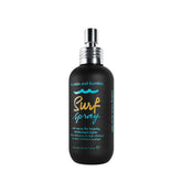 Bumble and bumble Surf Sea Salt Spray bottle shows matte texture and root volume.