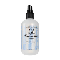 Bumble and bumble Thickening Blow-Dry Prep Spray bottle closeup boosts texture for fuller blowouts.