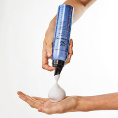 Bumble and bumble mousse demonstrates volume with flexible hold on styled hair