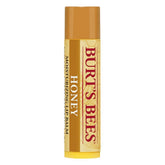 Burt's Bees Honey Moisturizing Lip Balm tube applying hydration for dry lips.
