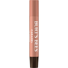 Swatches of Burt's Bees Lip Shimmer Caramel reveal buildable tawny beige color