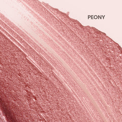 Swatch of Burt's Bees Lip Shimmer Peony reveals rosy pink shimmer.