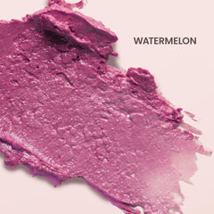 Lips wearing Burt's Bees Lip Shimmer Watermelon with a luminous watermelon glow.