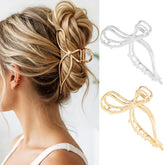 CAKURE bow claw clip in gold metal keeps hair secure and adds shine.