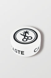 California Born styling paste bottle close-up showing texture boost for all hair types