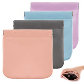 CANIPHA Lambskin pocket cosmetic bag in dark gray—soft, glossy finish for on-the-go touch-ups.