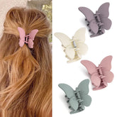 Canitor butterfly clip front view shows secure grip for all-day styling.