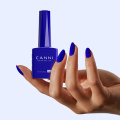 CANNI Royal Navy gel polish on brush during application.