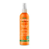 Cantu Coil Calm Detangler bottle promotes smooth detangling for natural curls.