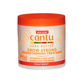 Cantu Grow Strong Strengthening Treatment bottle showing rich moisturizing formula.