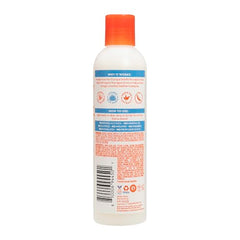Cantu Weightless Daily Leave-In Cream being applied to damp hair for detangling