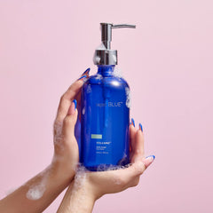 Capri Blue Volcano liquid soap close-up showing rich lather and bright fragrance.