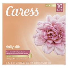 Caress Daily Silk espuma cremosa durante la ducha.