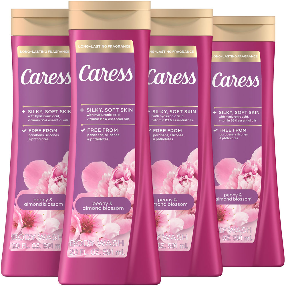 Caress Peony & Almond Blossom: botella visible, aroma floral duradero para duchas diarias.