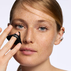 Catrice large powder puff for effortless blending across the cheeks and forehead.