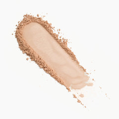 Catrice Under Eye Brightener powder brushed under-eye area for smoothing and brightness.