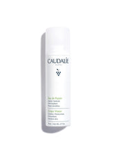 Caudalie agua de uva: neblina facial para hidratación ligera durante el viaje.