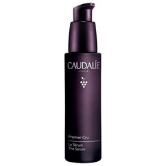 Caudalie Premier Cru serum bottle on vanity for daily anti-aging care.