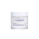 Caudalie Vinoperfect Brightening Moisturizer jar showing velvety texture for makeup prep