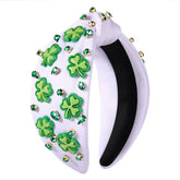 Diadema CEALXHENY con trébol verde y cristales, ideal para desfiles.