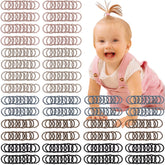 CÉLLOT brown baby hair ties close-up, gentle hold for toddlers.