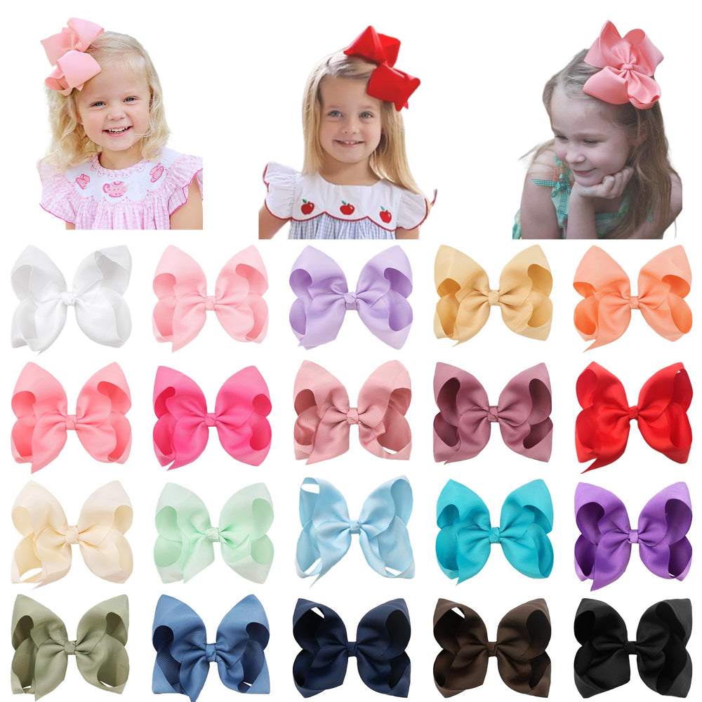Cellot big 6inch hair bow close-up with secure alligator clip for active wear.
