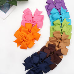 CÉLLOT grosgrain ribbon bow with durable clip ready for ponytails