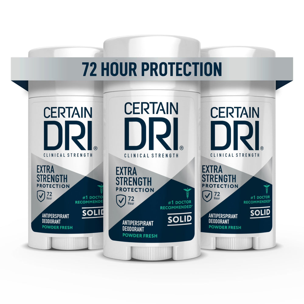 Certain Dri Extra Strength Clinical bottle close-up with powder-fresh scent for all-day odor protection.