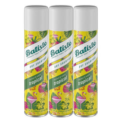 Batiste Tropical Champú Seco en botella para cabello sin grasa.