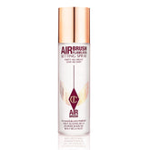 Charlotte Tilbury Airbrush Flawless Setting Spray bottle priming and hydrating makeup.