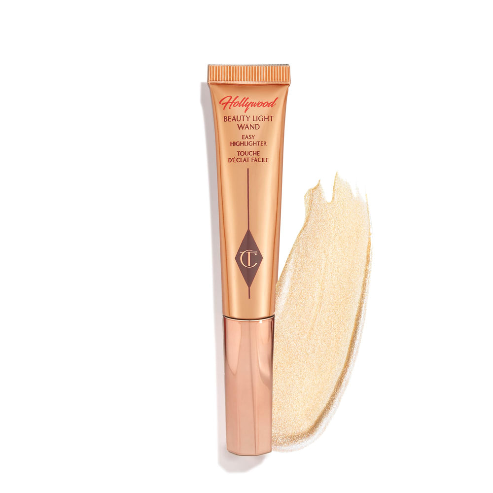 Charlotte Tilbury Beauty Light Wand Spotlight delivers a pearlescent glow on cheekbones.