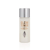 Charlotte Tilbury Glow Face Toner Mini — botella elegante para aplicación suave diaria.