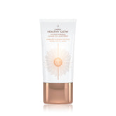 Charlotte Tilbury Healthy Glow Skin Tint bottle close-up showing soft radiance and bronzed warmth