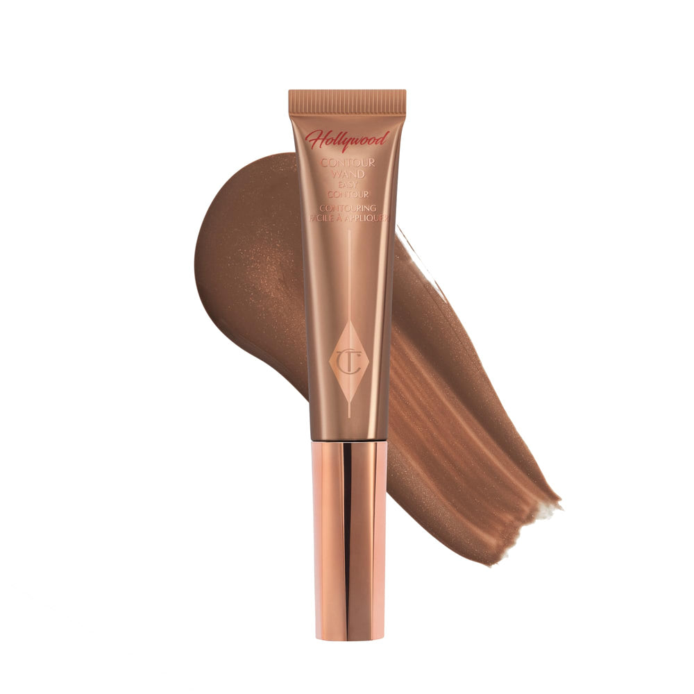 Charlotte Tilbury Hollywood Liquid Contour Wand applied to cheek hollows for lift.