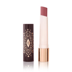 Charlotte Tilbury Hyaluronic Happikiss Pillow Talk closeup highlights dewy, hydrating nude-pink lips.