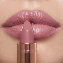 Charlotte Tilbury Pillow Talk Fair lip color in sleek tube ideal for everyday wear.