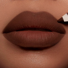 Waterproof Lip Cheat formula resists smudging during smiles and sips.