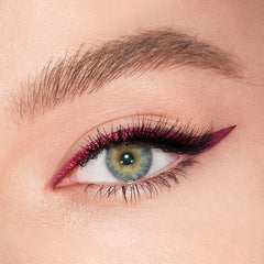 Charlotte Tilbury Magic Eyeliner mesmerising-maroon swatch shows rich color contrast