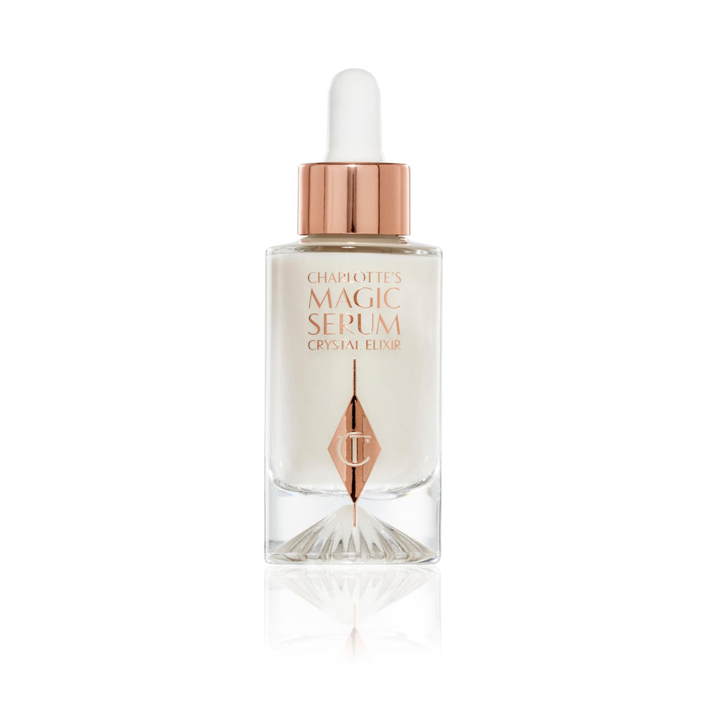Charlotte Tilbury Magic Serum Crystal Elixir bottle closeup showing firming and brightening benefits