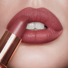 Charlotte Tilbury Pillow Talk Medium in-use application demonstrates smooth glide and blendability.
