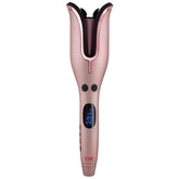 CHI Spin N Curl rose-gold curling iron close-up showing waves.