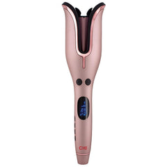 CHI Spin N Curl rose-gold curling iron close-up showing waves.