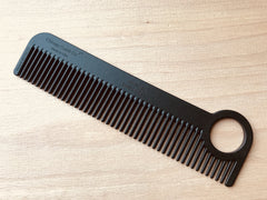 Chicago Comb Model 1 loop design offers easy grip and convenient hanging after styling.