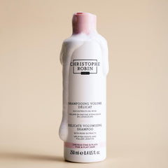 Christophe Robin Delicate Volumizing Shampoo gel texture on hair, easy lather.