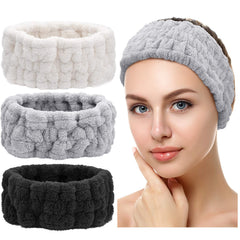 Banda Chuangdi negra para spa, suave y absorbente durante limpieza facial.