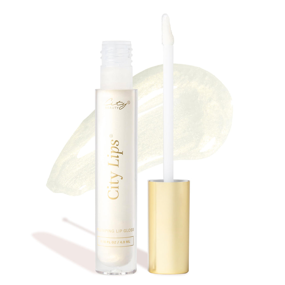 City Beauty City Lips Midnight Sparkle gloss delivers radiant shine and a fuller appearance.