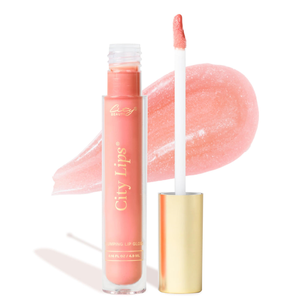 City Beauty City Lips South Peach gloss on lips for radiant plump glow.