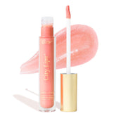 City Beauty City Lips South Peach gloss on lips for radiant plump glow.