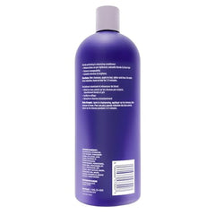 Shimmer Lights Purple Conditioner bottle pour demonstrates even application