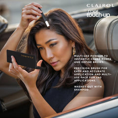 Clairol Root Touch-Up Powder application close-up on shaded roots.